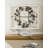 Metal Faux Wreath On Window Frame