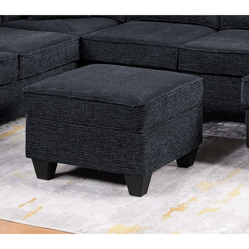 Canapé d'angle 5 pièces noir ardoise de style moderne, avec accoudoir gauche, méridienne à droite et éléments d'angle.
