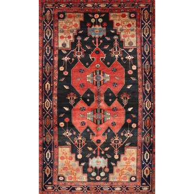 Tapis traditionnel noir / brun / rouge