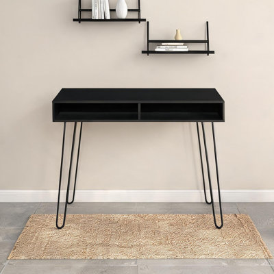 Bureau d'ordinateur noir profond avec pieds en épingle pour le travail à domicile dans un style contemporain