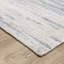 Tapis texturé ivoire / bleu à rayures patinées Michalski-1187342876