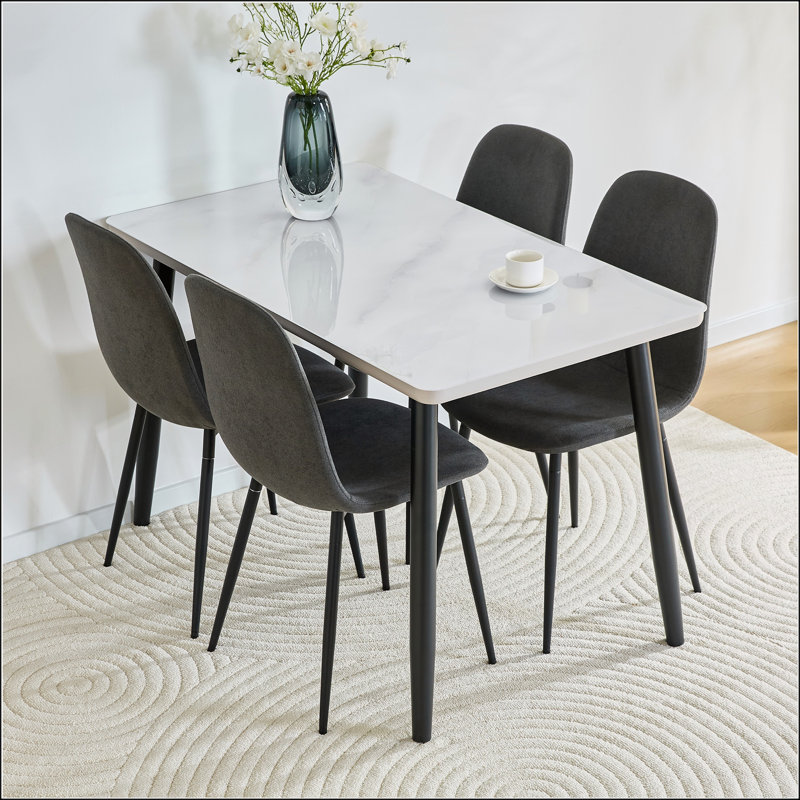 Table de salle à manger rectangulaire moderne avec plateau en verre trempé blanc et 4 chaises en lin et coton gris foncé pour les petits espaces et une salle à manger élégante
