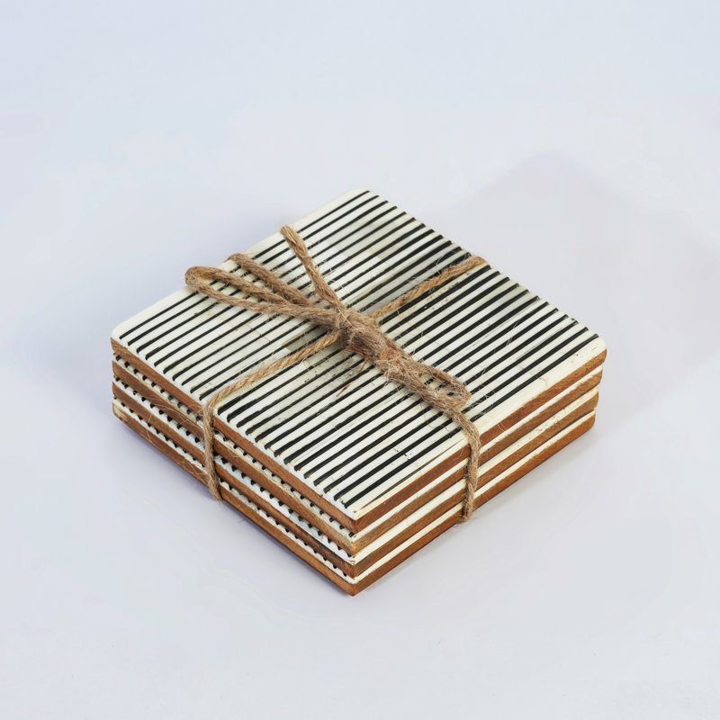 Ensemble de 4 sous-verres à fines rayures et résine
