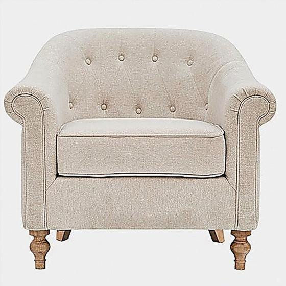 Fauteuil capitonné