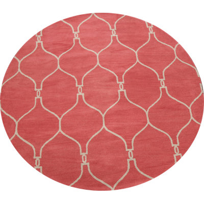 Tapis rose rond en laine touffeté à la main