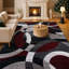 Tapis bourgogne / blanc / noir à motif abstrait tissé Archeveque - Tapis en polypropylène géométrique moderne pour le salon, la chambre à coucher ou le couloir-33380021