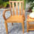 Bednarz 8 - Person Teak Wood Patio Dining Set with Oval Table , Sunbrella® Cushions Included