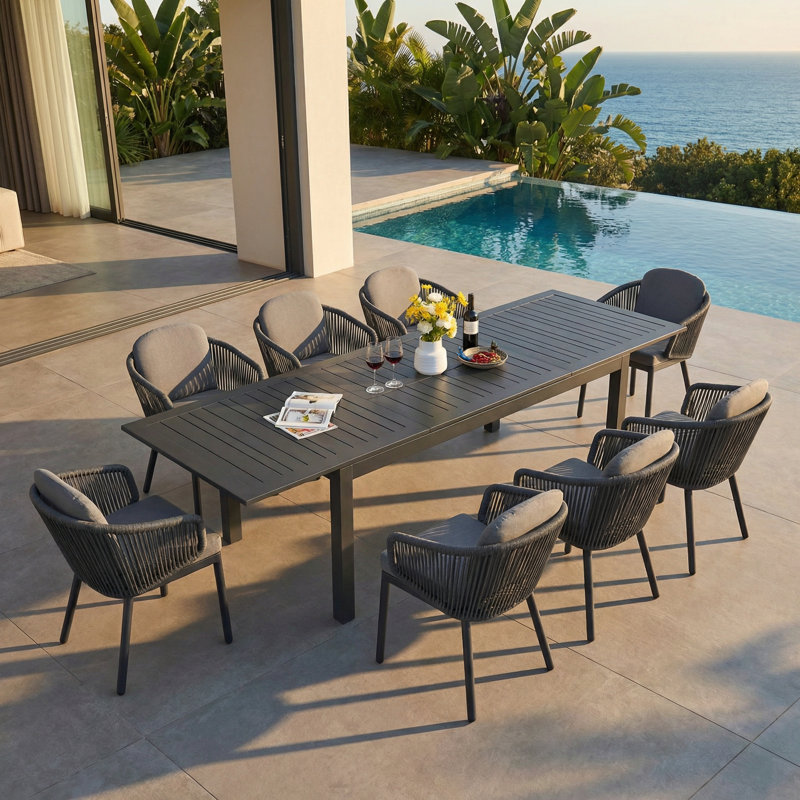 Ensemble repas pour 8 personnes en aluminium avec table rectangulaire extensible, coussins inclus