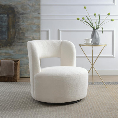 Fauteuil demi-tonneau pivotant en tissu Teddy avec coussin moelleux