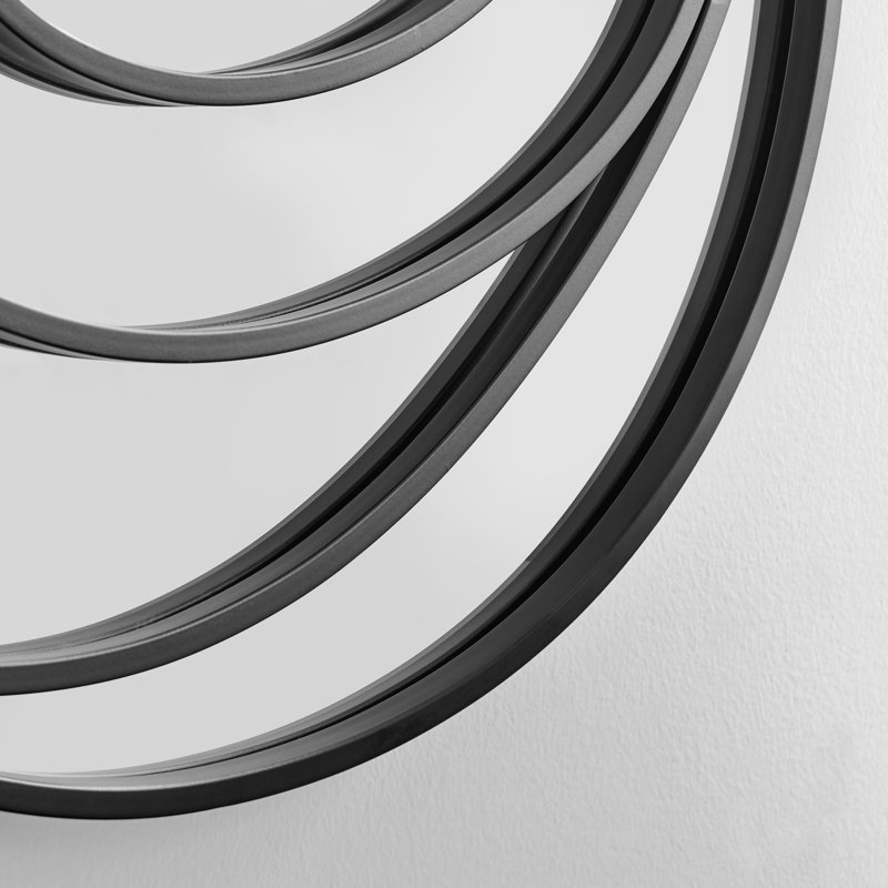 Crotts 25.5-inch Contemporary Continuous Circles Wall Mirror with Black Iron Accents