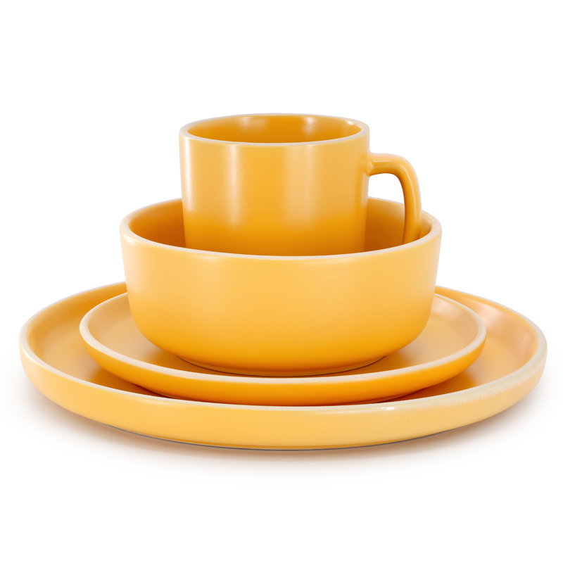Gibson Home Zuma 16 Piece Round Stoneware Dinnerware Set in Matte Yellow