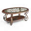 Table basse Freudenburg rustique avec plateau en verre et pieds en métal thermolaqués
