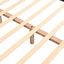 Confortable lit double gris avec tête de lit distinctive en forme de biscuit et structure stable en chenille