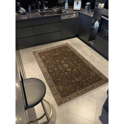 Tapis décoratif beige à motif floral multicolore