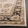Mainville Oriental Ivory/Brown Area Rug