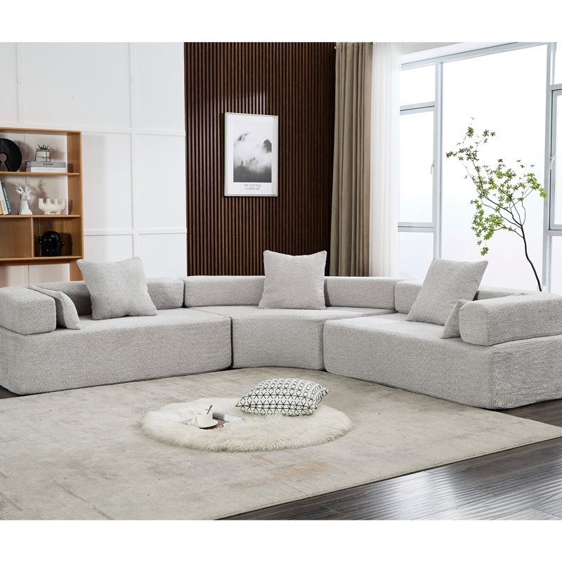 Option courbée grise à 4 places - tissu bouclé, style de salon moderne, pour un espace confortable