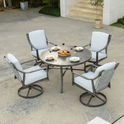 Dester Round 4 - Person Dining Set with 4 Swivel&Rocking Chair and Cushions