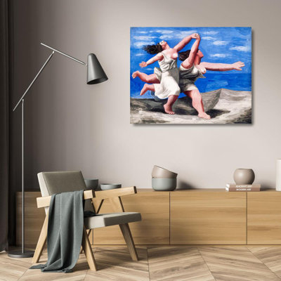 Two women running on the beach (The race)