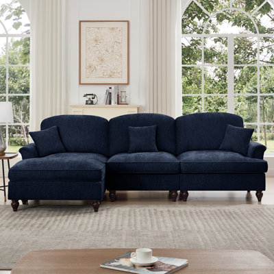 Canapé modulaire en forme de L Mid-Century à trois places avec accoudoirs évasés et jupes plissées à volants, tissu en chenille, repose-pieds mobile, bleu