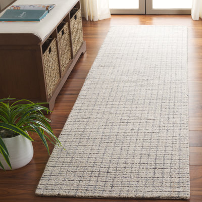 Mireille Ebony Hand Tufted Wool/Cotton Geometric Rug in Light Blue/Ivory