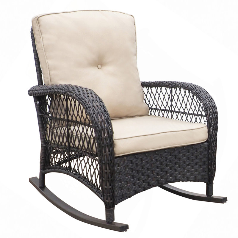 Chaise berçante d'extérieur en rotin avec coussins
