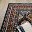 Tapis géométrique en laine tissé à la machine en gris / brun-715251366