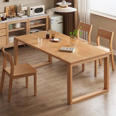 Solid wood rectangular dining table in natural wood color