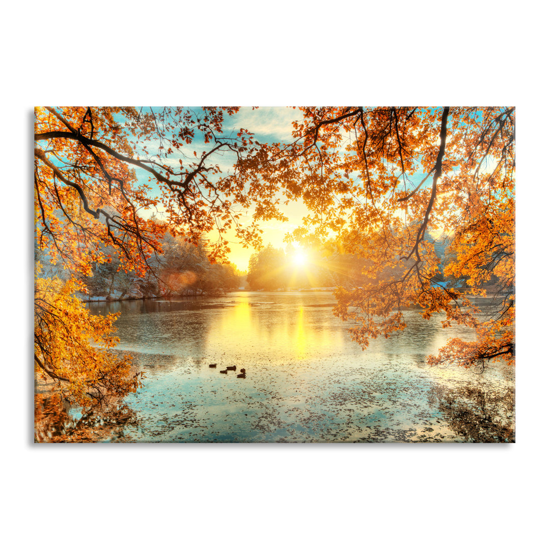 Glasbild Herbstbäume am See bei Sonnenuntergang