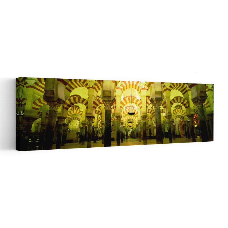 Interiors Of A Cathedral La Mezquita Cathedral Cordoba Cordoba Province Spain by Hendrik Holler - Wrapped Canvas Panoramic Print