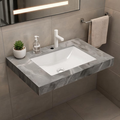 Comptoir en pierre frittée gris clair de 76 cm (30 pouces) et lavabo encastré en céramique avec un trou pré-percé pour robinetterie standard.