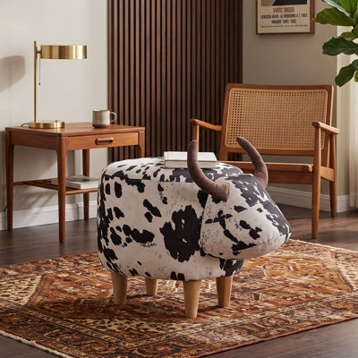 Repose-pieds en forme de vache avec pieds