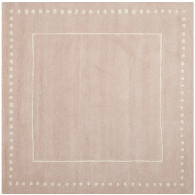 Tapis beige en laine touffeté à la main Cruz