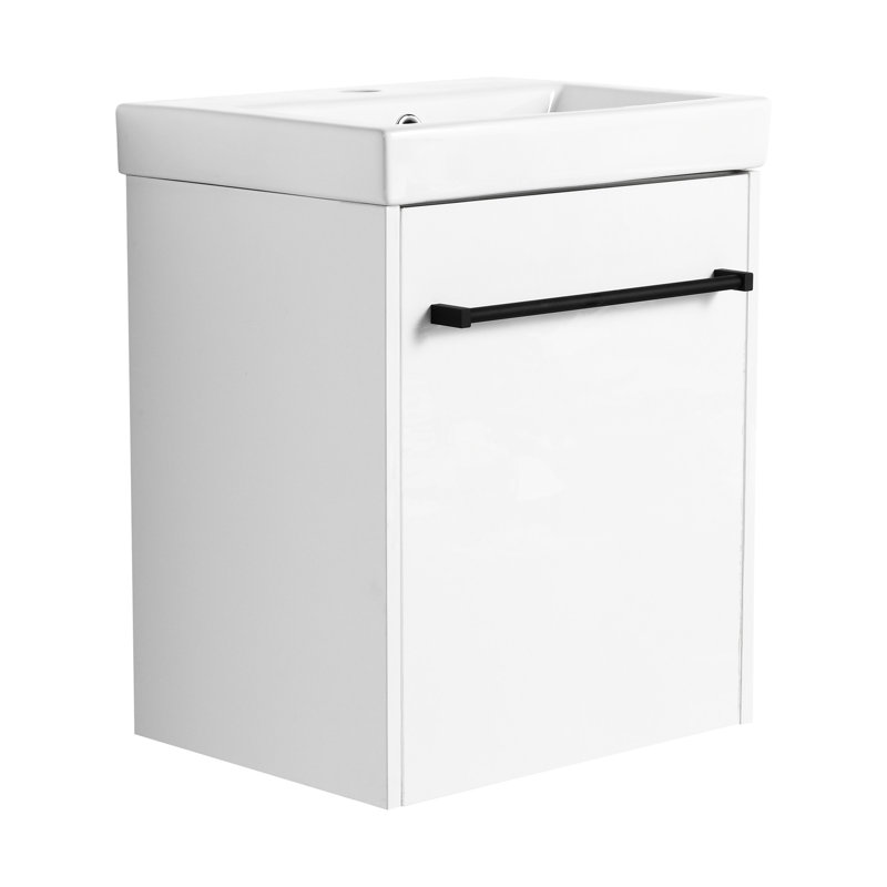Meuble-lavabo de 18 po. Lavabo en céramique avec porte d'armoire à fermeture en douceur. Look moderne pour les salles de bain compactes. Fabrication en contreplaqué pour une utilisation en douceur. Concevez de petits espaces. Fabriqué