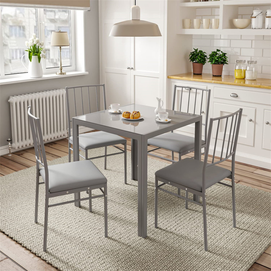 Dorrien Glass Top Metal Base Dining Table