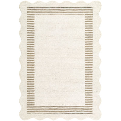Tapis festonné fait à la main
