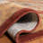 Ezell Hand Tufted Wool/Cotton/Latex Floral Rug in Rust-16768922
