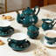 Service à thé en porcelaine 22 pièces pour 6 avec théière, tasses, soucoupes et pièces de service - motif floral en relief élégant