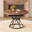 A Circular Dining Table With A Diameter Of 47.3 Inches, Featuring 4 Walnut Wood Grain MDF Tabletops, Black Hourglass Shaped Metal Brackets, And A Modern Industrial Style Dining Table For 4-6 People.-1751894506