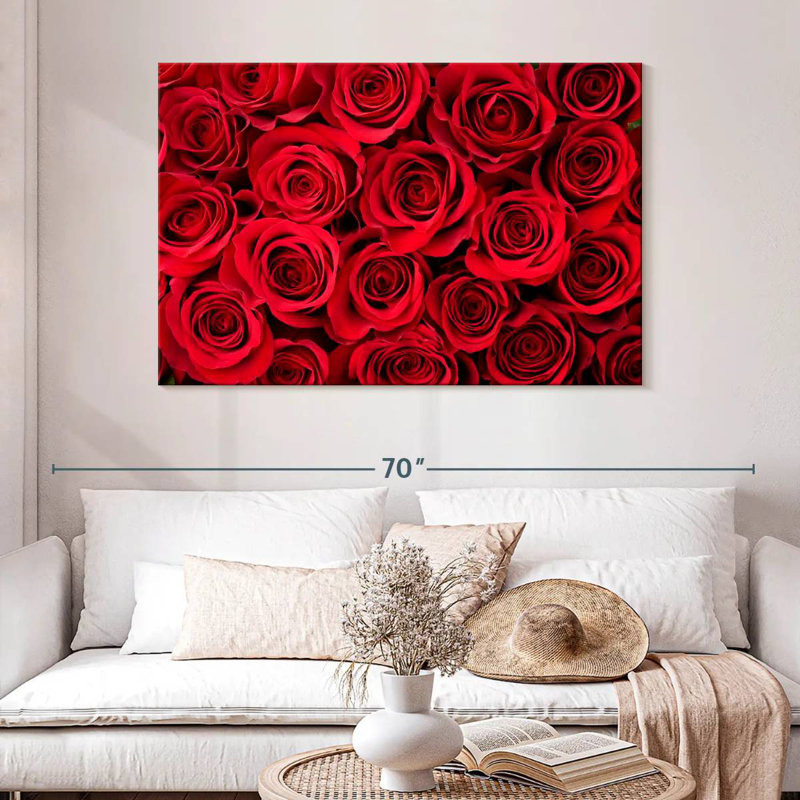 Harnek qui fleurit des roses rouges