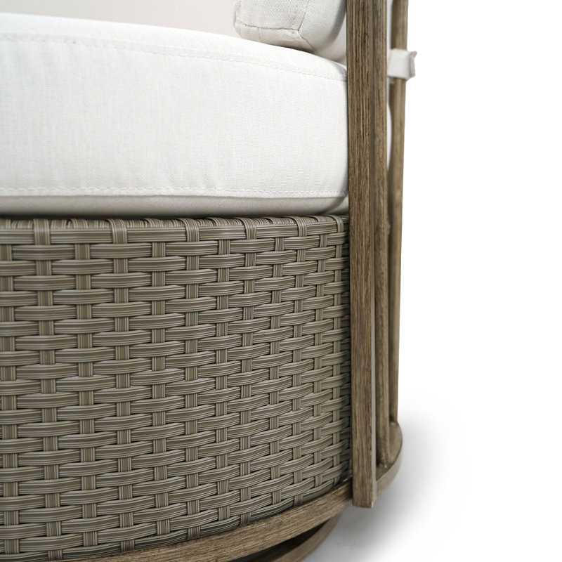 Chaise berçante et pivotante en osier avec coussins (ensemble de 1)