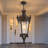 Regal Outdoor Pendant Light - Ornate Crown Motif, Clear Seeded Glass Shade, Weatherproof Metal Fixture