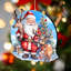Ornement en forme de père Noël avec renne par G. Debrekht