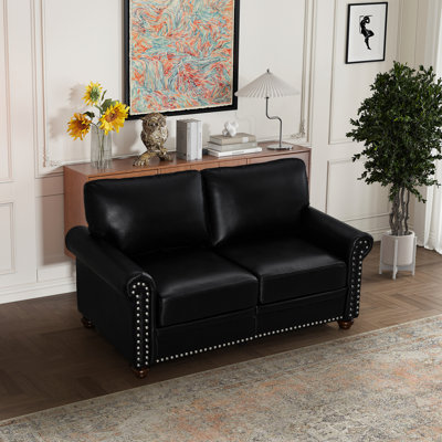 Similicuir noir pour le salon et la structure, expérience d'assise confortable, capacité de poids de 600 lb, processus d'assemblage facile, décoration des clous, espace de rangement moderne