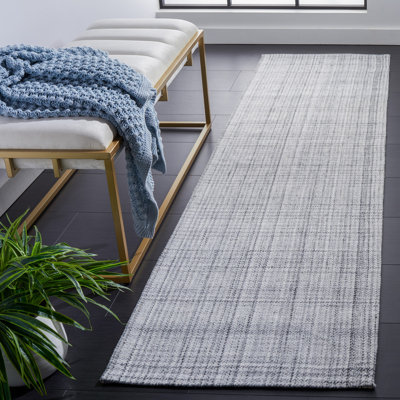 Earica Hand Woven Performance Plaid Area Rug