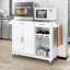 Îlot de cuisine avec plateau en acier inoxydable et cabine de rangement-586150391