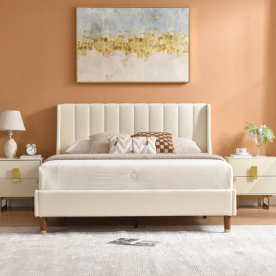 Linvel Upholstered Wingback Platform Bed