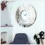 Horloge murale miroitante