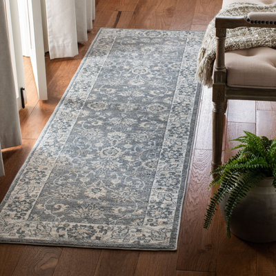 Swinehart Oriental Hand Woven Area Rug