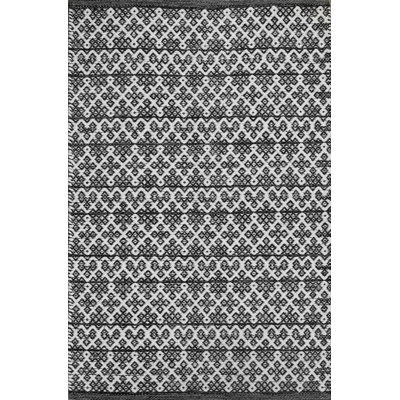 Tapis noir en coton fabriqué à la main Alodie