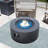 40,000 BTU 28 in. Round Iron Propane Fire Pit Table with Tank Cover and Glass Wind Guard in Dark Gray-1655041858